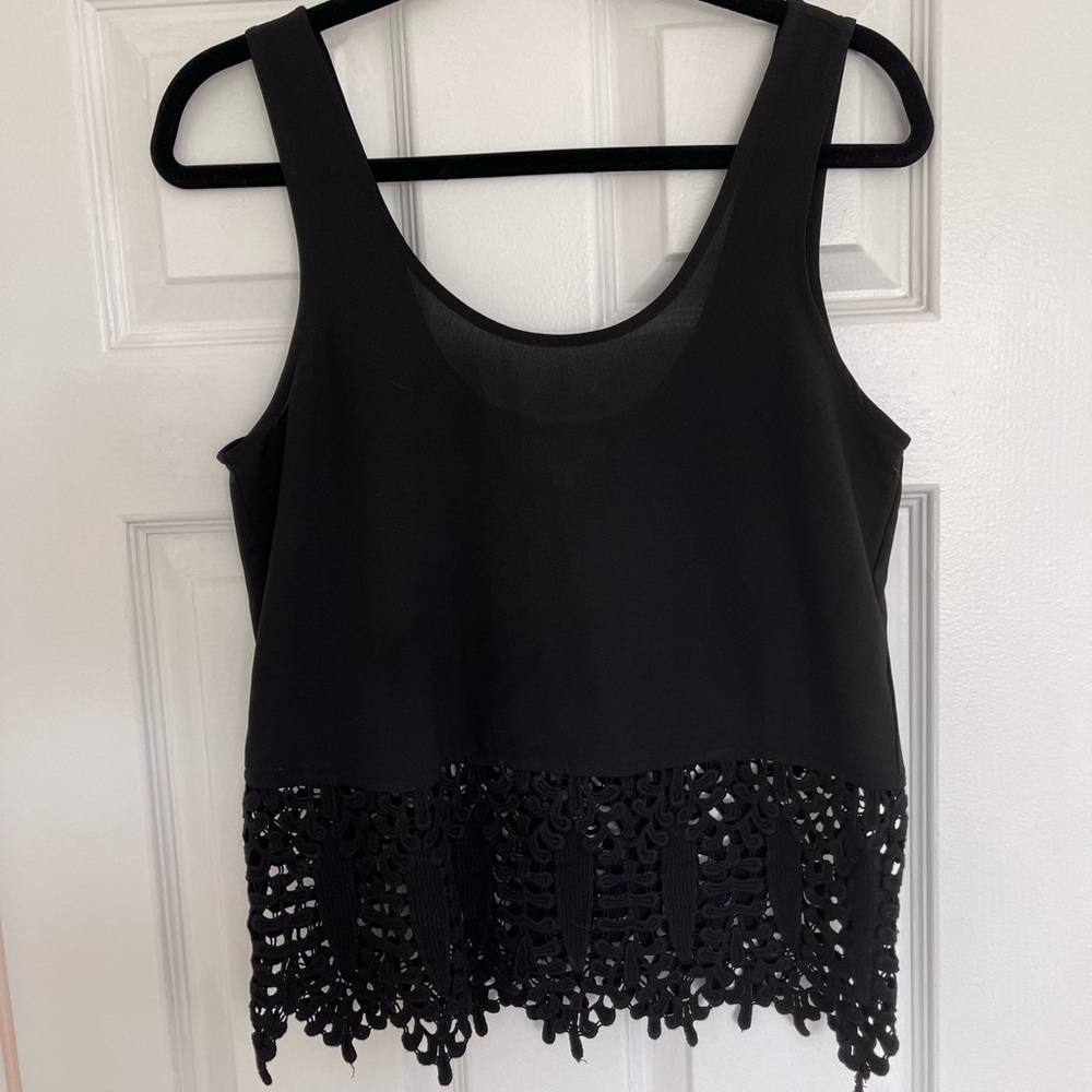 Black summer top with embroidered hem
